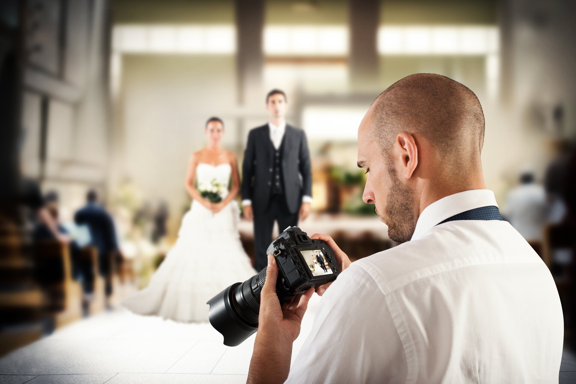 Professioneller Fotograf bei einer Hochzeit